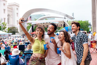 group of people taking selfie at Baton Rouge Blues Fest