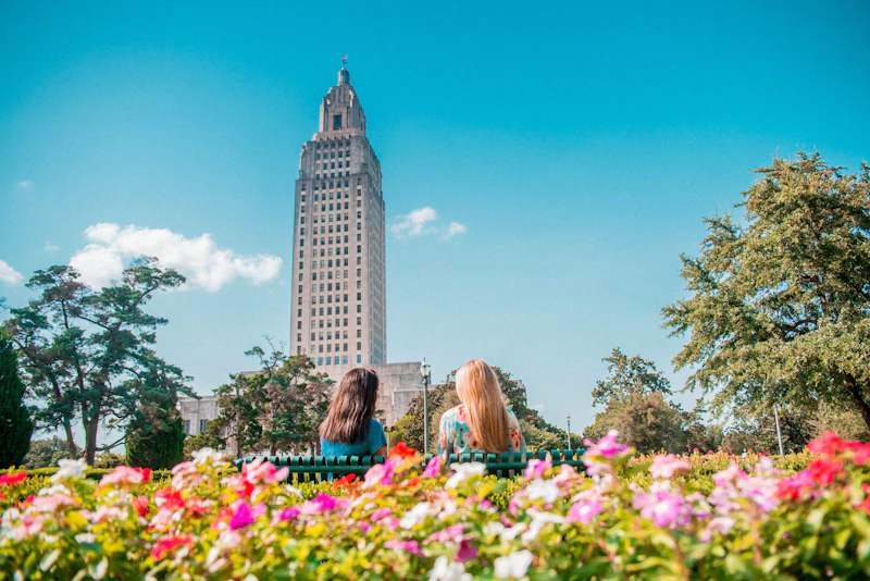 Two girls, garden, capitol building