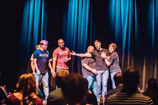 Actors On Stage At A Baton Rouge Comedy Show