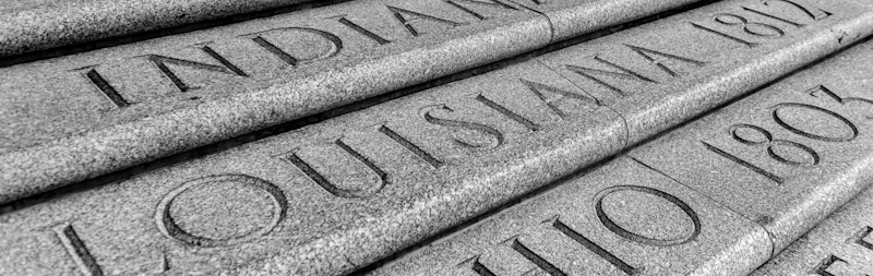 Close up of Louisiana text carved in granite at State Capitol