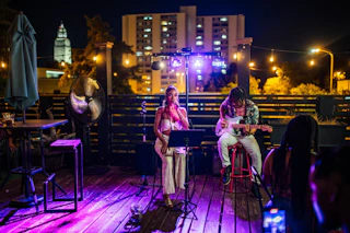 singer and guitarist on the Main Lobby rooftop
